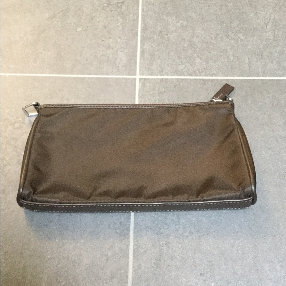 NWOT Petite Tumi dark brown cosmetic bag